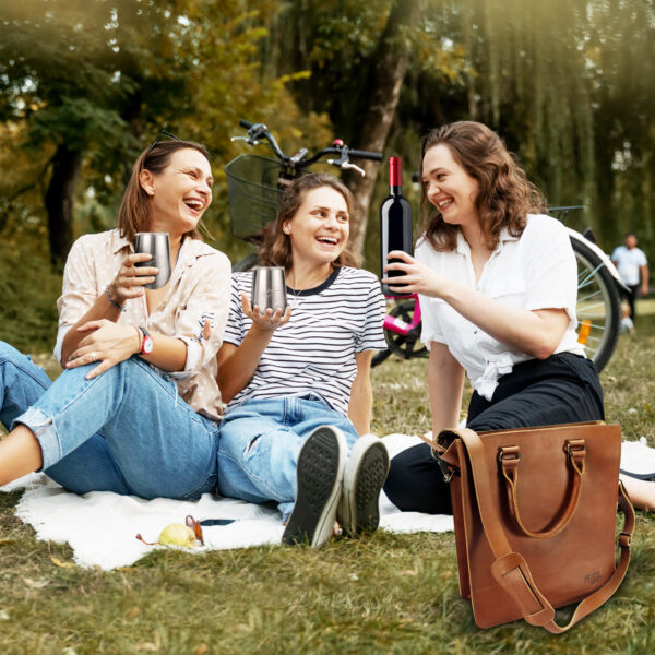 Three Women Having a Picnic With Wine